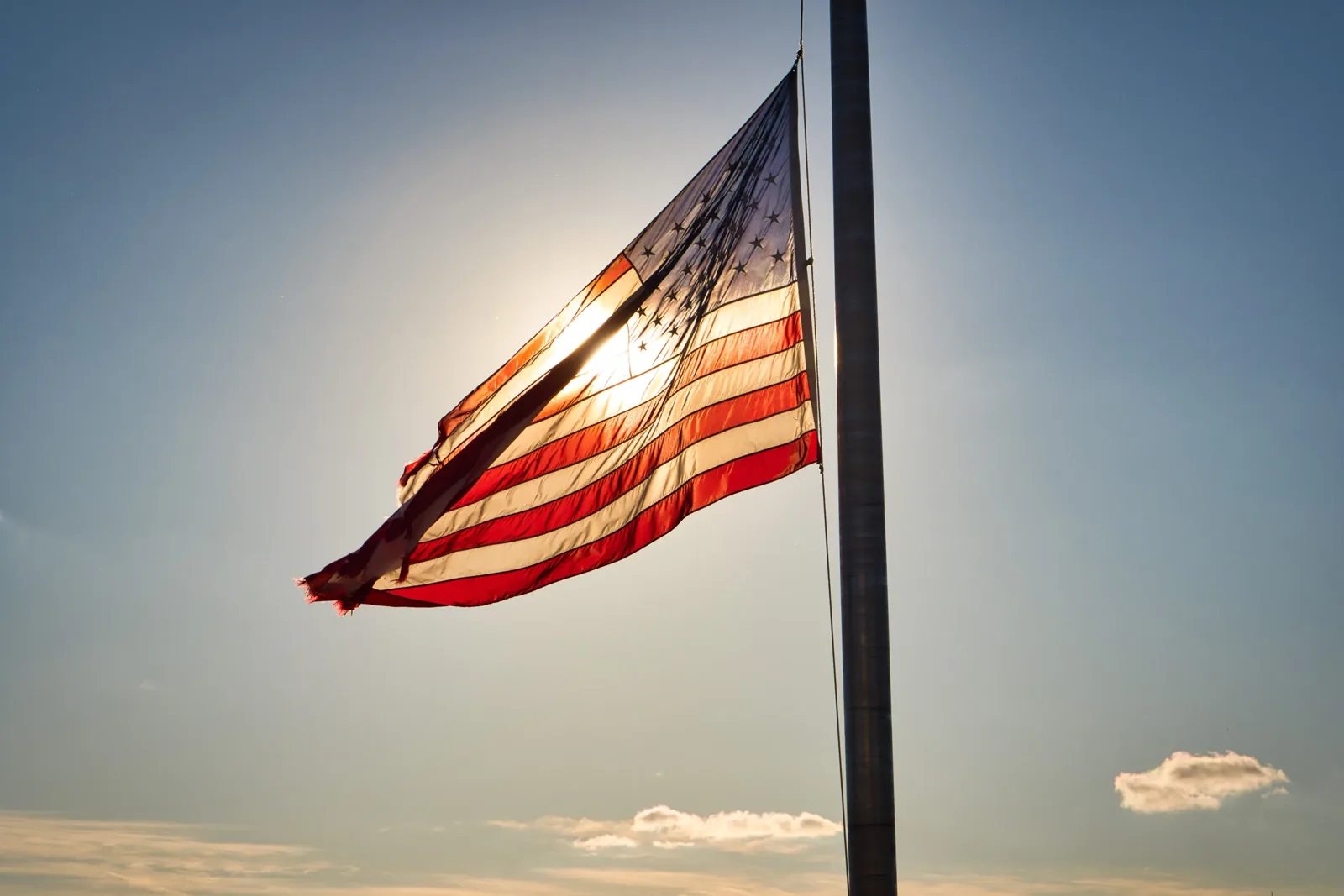 An American flag against the sky