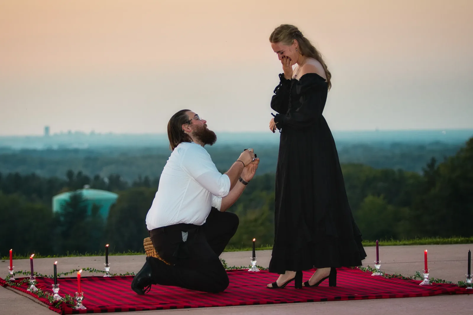 A marriage proposal at sunset