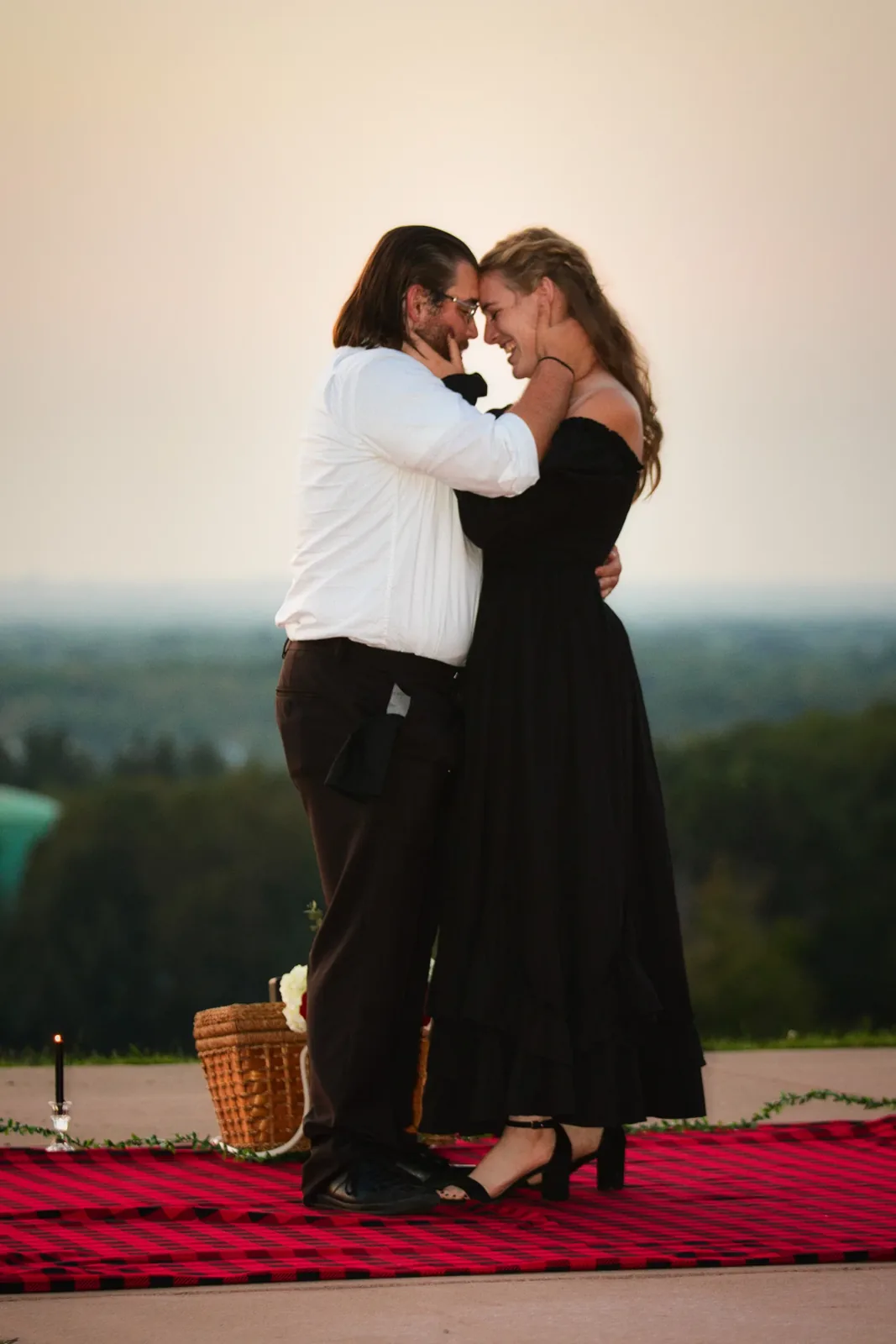 A couple holding each other at golden hour